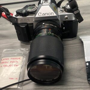 Canon AE-1 Program 35mm Film Camera - Black and Silver Finish